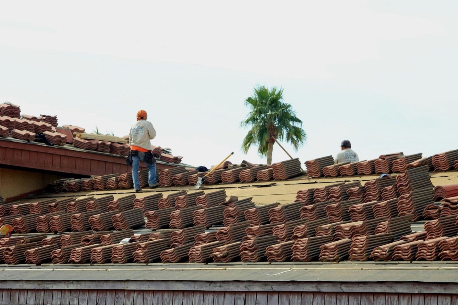 Roofer on a roof — professional website design for roofers and roofing companies