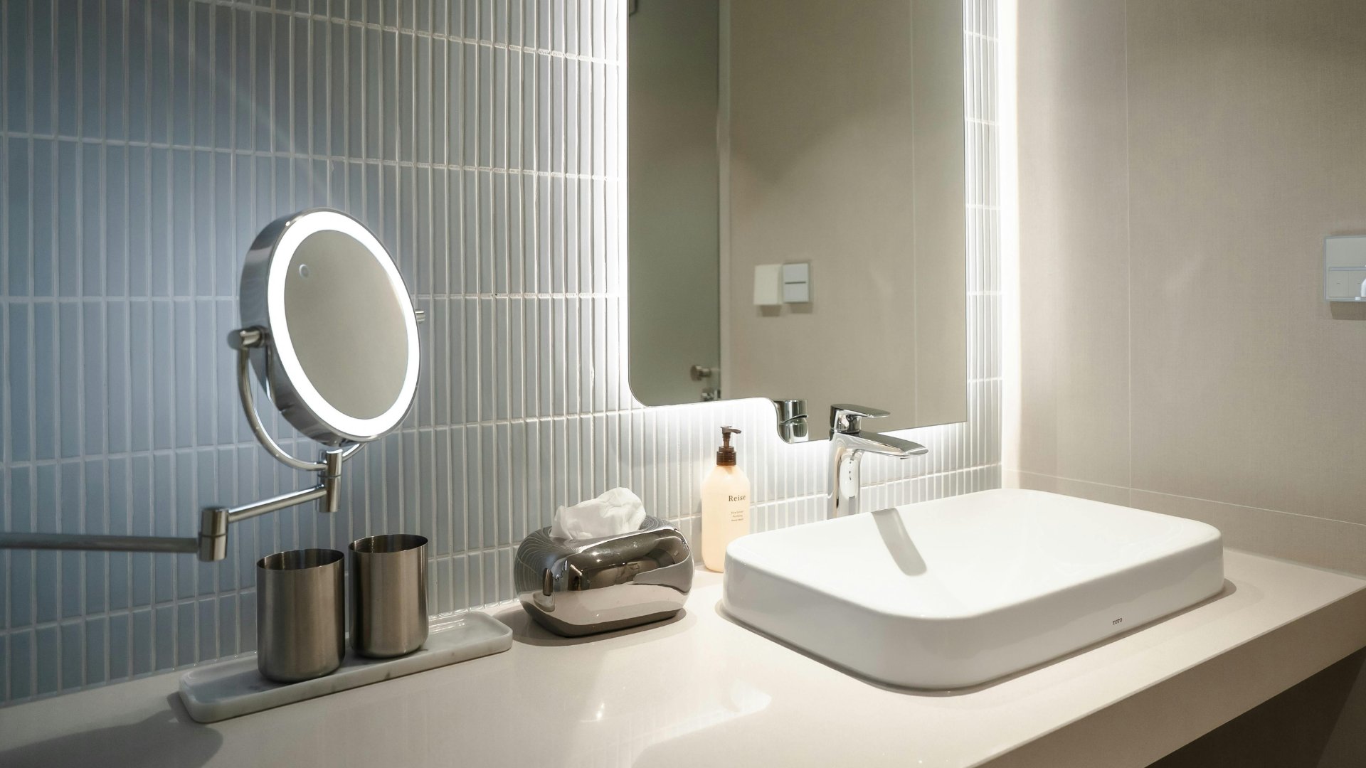 Bathroom sink and mirror installed in a Manchester home