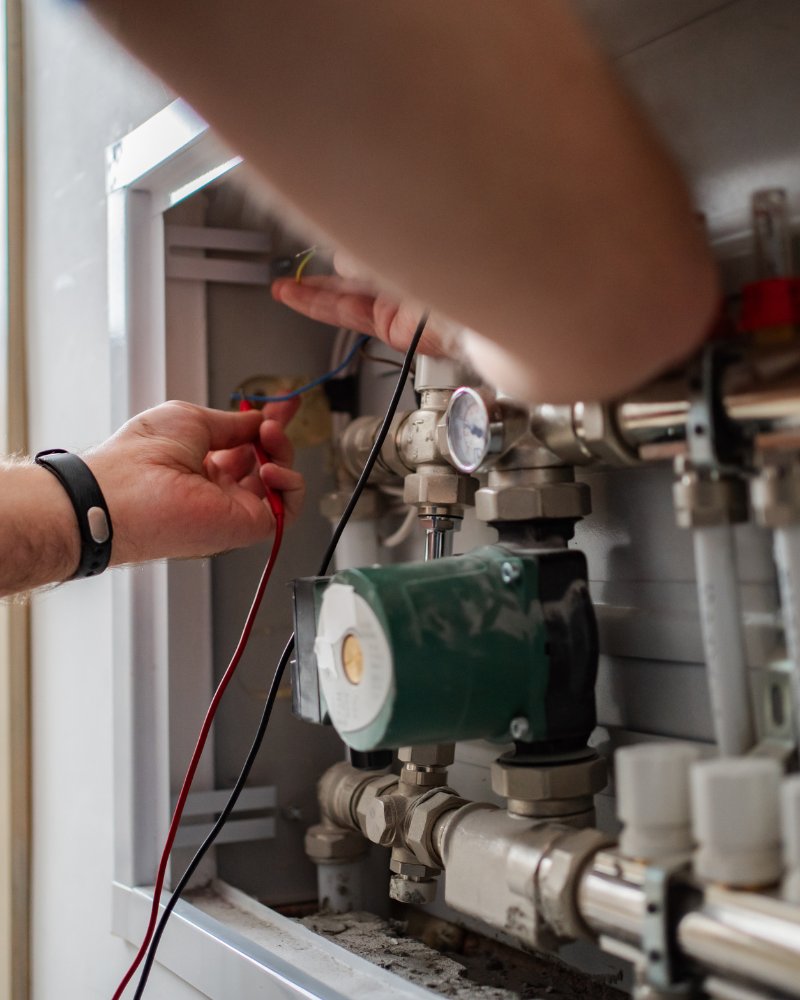 Flow Plumbing & Heating engineer at work in a Manchester home